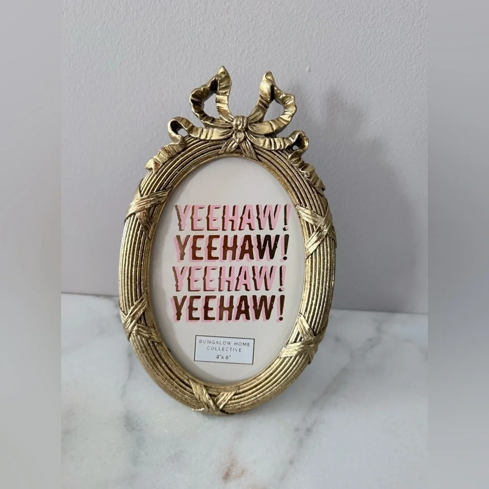 Gold Oval Frame with bow on top antique style  4”x6”